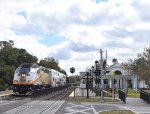 A DeLand bound Sunrail Train departs the magnificent Winter Park Station behind MP32PH-Q # 109.